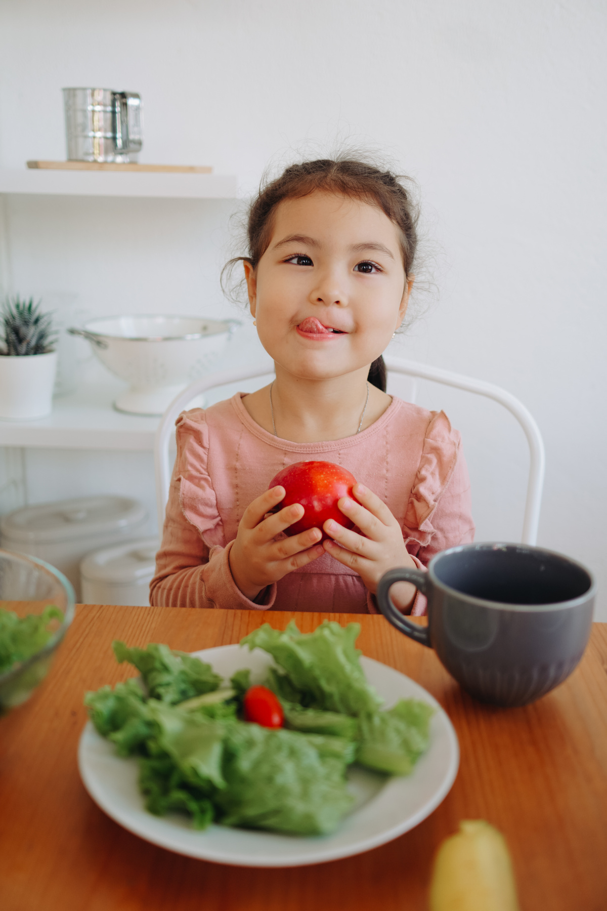 Little Girl with a Plate of Salad 